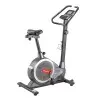 Vélo de fitness à résistance manuelle pour training de cardio en salle de sport personnelle.
