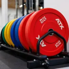 Disques de poids bumpers plates ATX fitness design colorés disponibles de 5 à 25 kg